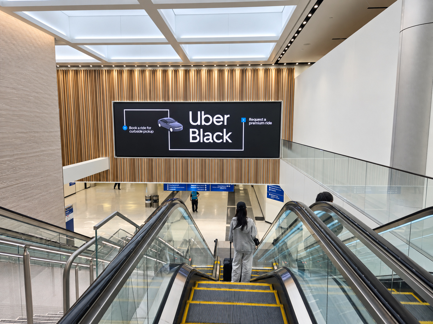 Example of digital escalator spectaculars in an airport terminal