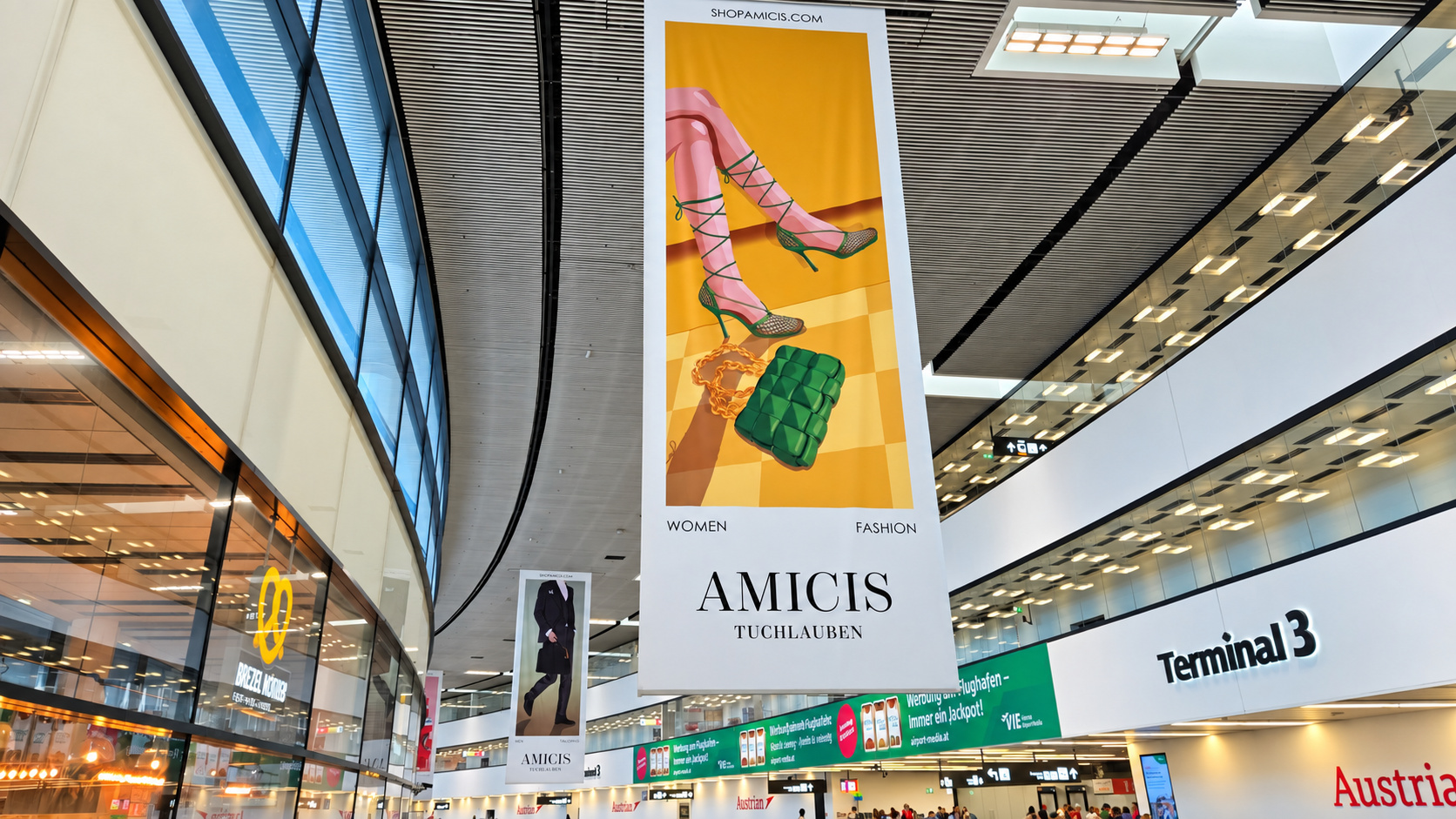 Example of overhead banner packages in an airport terminal