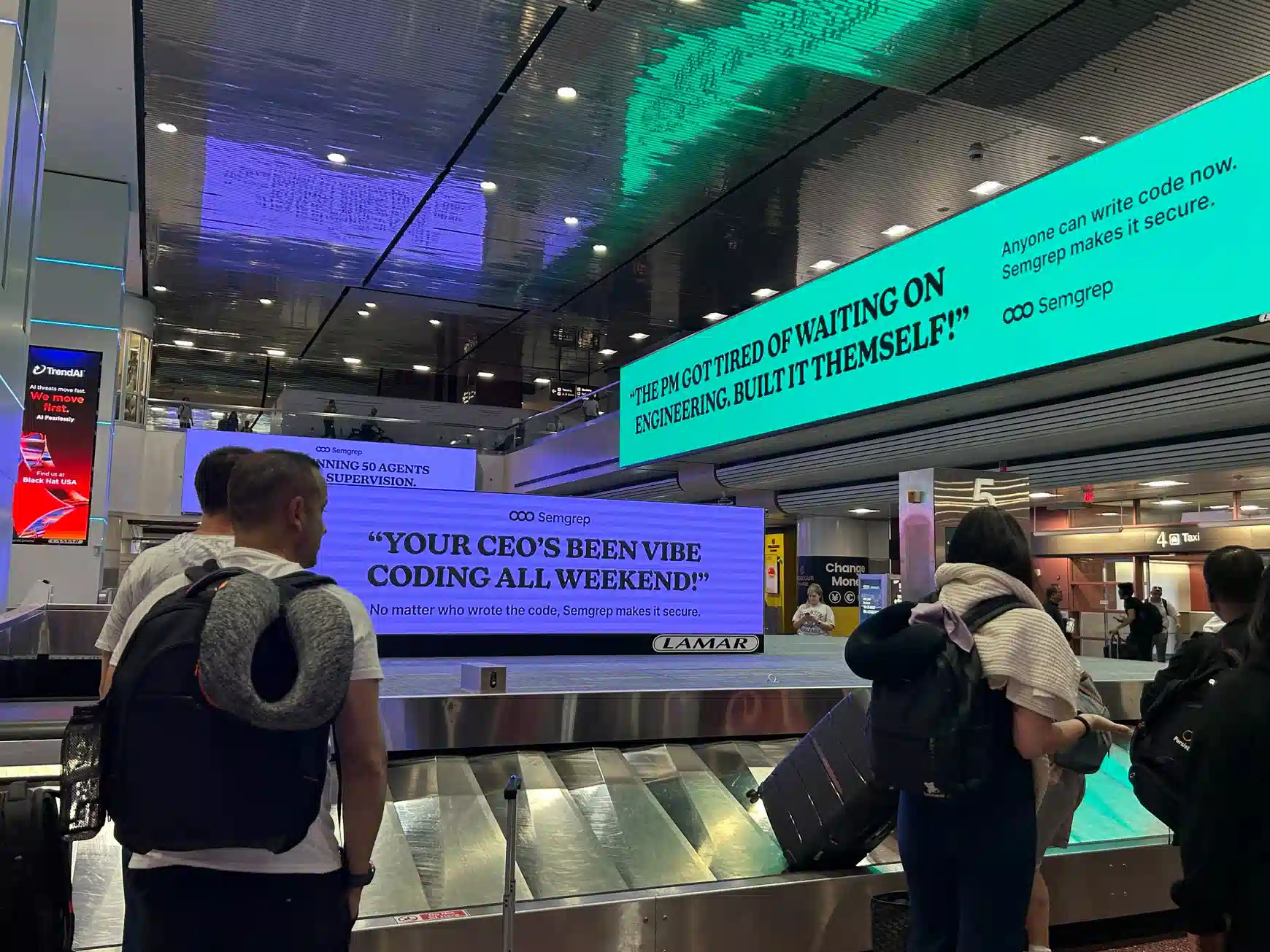 Thomson Reuters CoCounsel ad on the spectacular digital network in Terminal 1 bag claim at LAS