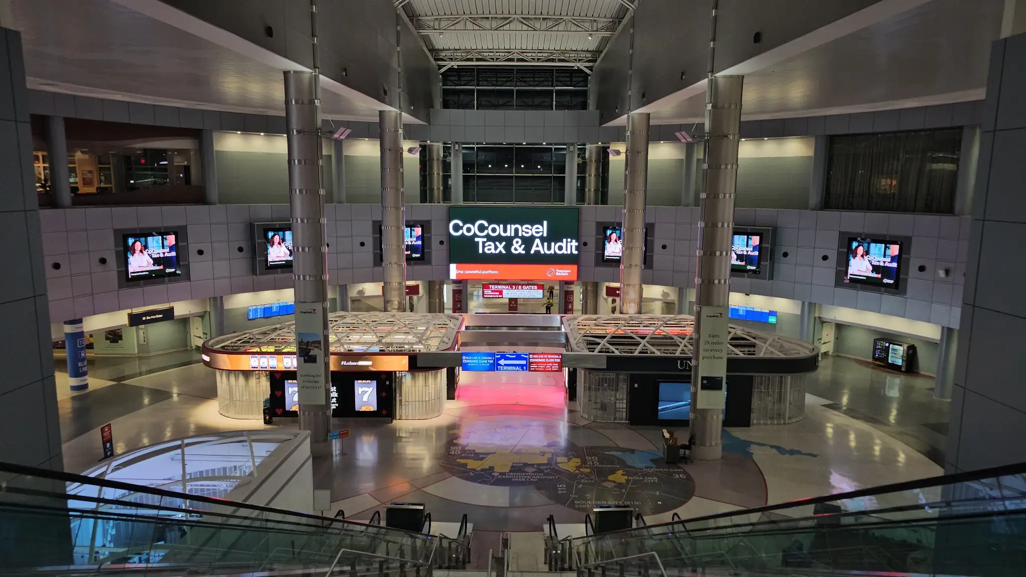 Semgrep ad on the digital network overlooking the LAS terminal atrium